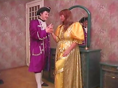 Lustful couple in fancy costumes fucking in bed hardcore