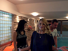 A couple of foxy sluts sit on his dick by the pool