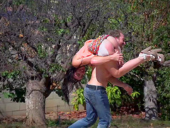 Oiled chick has her pink cunt stretched