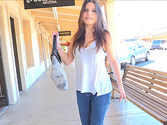 Out in public she pulls her jeans down and shows some ass
