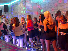 Party girls fool around with the male strippers in the club