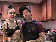 Girls show off their tattoos and chat behind the scenes