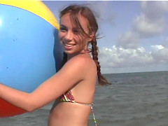 Pigtails brunette in bikini playing outdoor then fucked