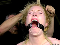 Tied bondage blonde screams when screwed with toy in BDSM