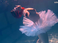 Short hair maiden swimming lovely displaying her curves in pool