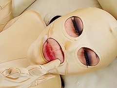 Horny slag in a full-body latex suit gets her snatch pumped