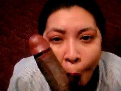 Housewife sucks on a black mans cock