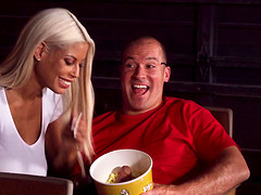 Bridgette B rides a guy's massive dick during a movie