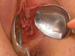 Two milfs are having fun with a single cock and a bunch of kitchen utensils.