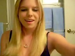 Blonde removing her black lingerie