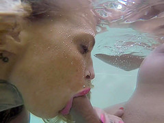 Busty Calisi Ink enjoys slurping on a big delicious shaft