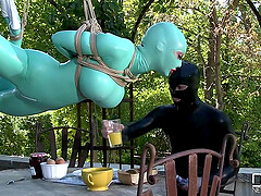 costumed Latex Lucy enjoys kinky sex games with a guy while she hangs