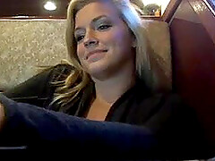 Blonde babe showing tits in cafe