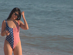 Video of naughty wife Sophia flashing her sexy body by the sea